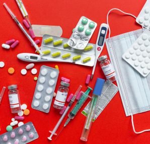 Medical supplies and medications displayed on a red background, emphasizing healthcare essentials. — 2020 vision: Looking at